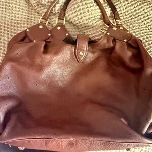 Authentic Gentle Used Mahina Louis Vuitton leather bag